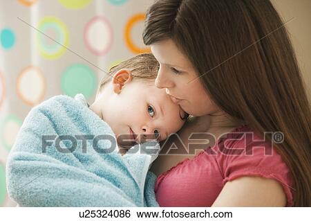 Mother with son (2-3) wrapped in towel View Large Photo Image Stock Photograph - Mother with son (2-3) wrapped in towel. Fotosearch