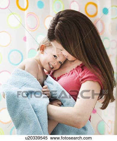 Mother with son (2-3) wrapped in towel View Large Photo Image Stock Photography - Mother with son (2-3) wrapped in towel. Fotosearch