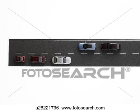 Overhead view of toy cars on toy road View Large Photo Image Stock Photograph - Overhead view of toy cars on toy road. Fotosearch