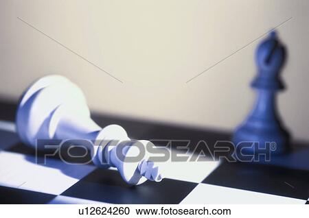 Stock Image - Pawn on chess board. Fotosearch