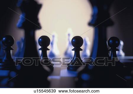 Stock Photo - Pawns on chess board. Fotosearch