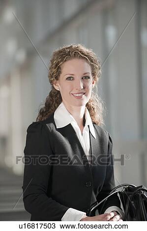 Stock Image - Portrait of businesswoman. Fotosearch