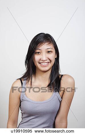 Portrait of cheerful young woman View Large Photo Image Stock Photography - Portrait of cheerful young woman. Fotosearch