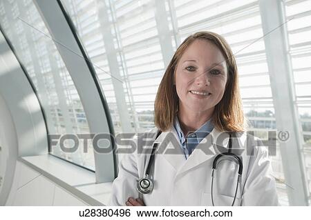 Portrait of female doctor View Large Photo Image Stock Photograph - Portrait of female doctor. Fotosearch