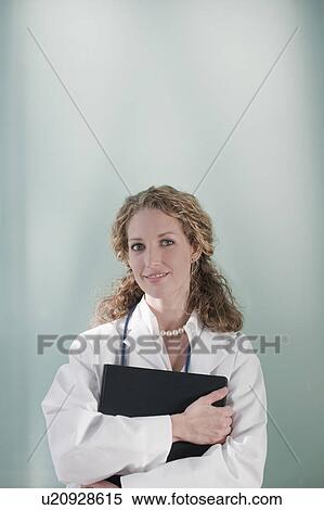 Stock Photography - Portrait of female doctor. Fotosearch