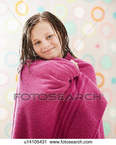 Portrait of girl (10-11) wrapped in towel View Large Photo Image Stock Image - Portrait of girl (10-11) wrapped in towel. Fotosearch