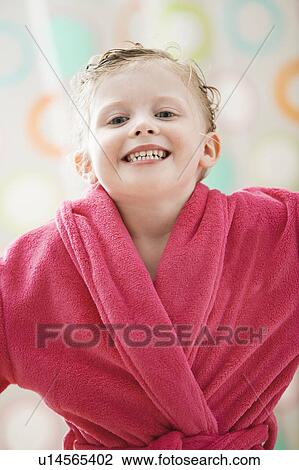 Portrait of girl (2-3) wrapped in bathrobe View Large Photo Image Stock Image - Portrait of girl (2-3) wrapped in bathrobe. Fotosearch