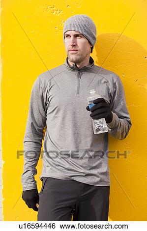 Stock Photograph - Portrait of man in workout wear. Fotosearch