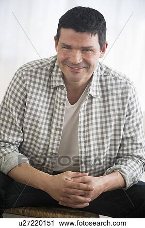 Portrait of mature man smiling View Large Photo Image Stock Image - Portrait of mature man smiling. Fotosearch