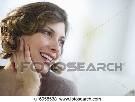 Stock Photo - Portrait of smiling woman. Fotosearch
