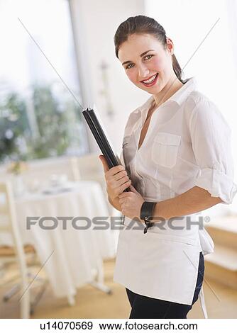 Stock Photo - Portrait of young waitress. Fotosearch