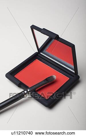 Powder compact with small brush View Large Photo Image Stock Image - Powder compact with small brush. Fotosearch