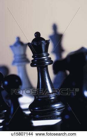 Queen chess piece on chess board View Large Photo Image Picture - Queen chess piece on chess board. Fotosearch