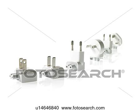 Stock Image - Row of plugs on white background. Fotosearch