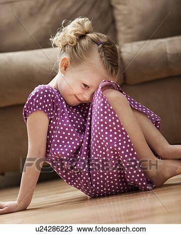 Shy girl (2-3) slitting on floor View Large Photo Image Stock Image - Shy girl (2-3) slitting on floor. Fotosearch