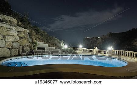 Spain, Costa Blanca, Hotel swimming pool View Large Photo Image Stock Photo - Spain, Costa Blanca, Hotel swimming pool. Fotosearch