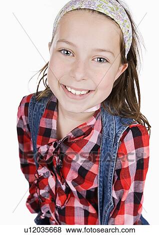 Stock Photo - Studio portrait of girl (8-9). Fotosearch