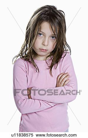 Stock Photography - Studio portrait of sad girl (8-9). Fotosearch