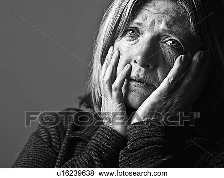 Studio portrait of sad senior woman View Large Photo Image Stock Photo - Studio portrait of sad senior woman. Fotosearch