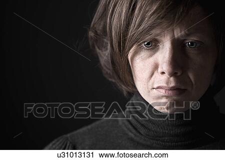 Studio portrait of sad woman View Large Photo Image Stock Image - Studio portrait of sad woman. Fotosearch