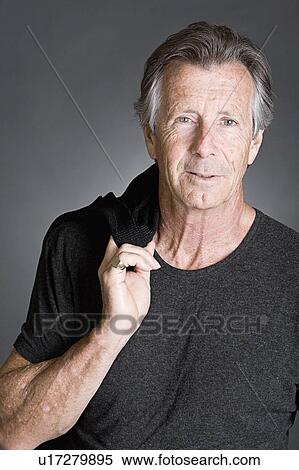 Studio portrait of senior man View Large Photo Image Stock Photography - Studio portrait of senior man. Fotosearch