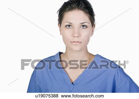 Stock Photo - Studio portrait of teenage medical student (14-15). Fotosearch