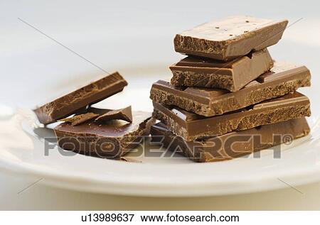 Studio shot of chocolate on plate View Large Photo Image Stock Photo - Studio shot of chocolate on plate. Fotosearch