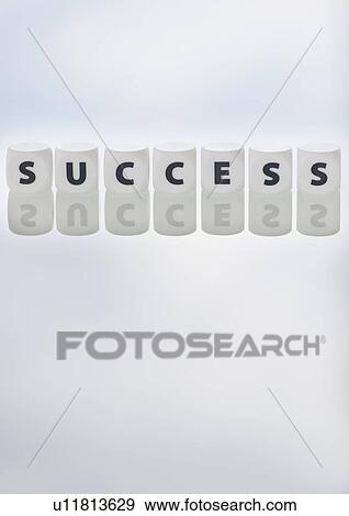 Stock Photo - Studio shot of dice spelling out success. Fotosearch