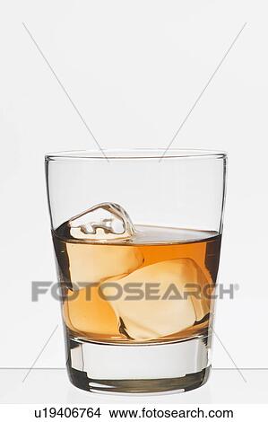 Picture - Studio shot of glass of whiskey. Fotosearch