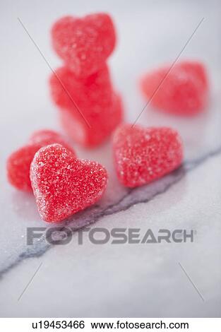 Studio shot of heart-shaped candies View Large Photo Image Stock Photograph - Studio shot of heart-shaped candies. Fotosearch
