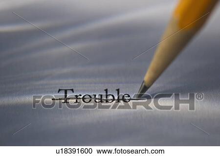 Studio shot of pencil crossing out the word trouble from piece of paper View Large Photo Image Stock Image - Studio shot of pencil crossing out the word trouble from piece of paper. Fotosearch
