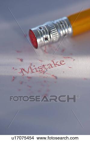 Picture - Studio shot of pencil erasing the word mistake from piece of paper. Fotosearch