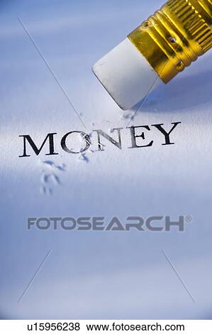 Stock Photo - Studio shot of pencil erasing the word money from piece of paper. Fotosearch