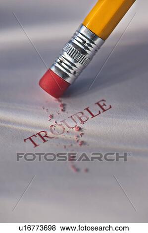 Studio shot of pencil erasing the word trouble from piece of paper View Large Photo Image Stock Photo - Studio shot of pencil erasing the word trouble from piece of paper. Fotosearch