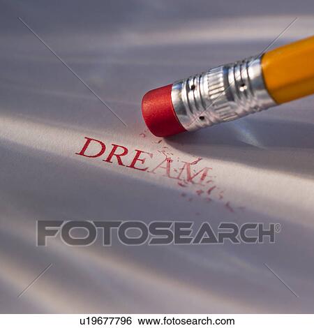 Stock Photograph - Studio shot of pencil erasing the word dream from piece of paper. Fotosearch