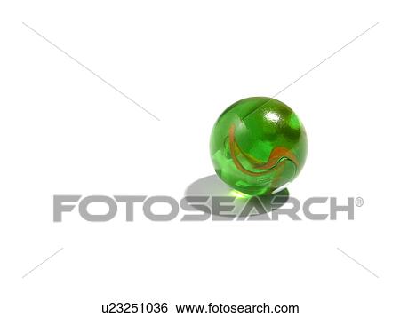 Stock Photograph - Studio shot of small green glass ball. Fotosearch