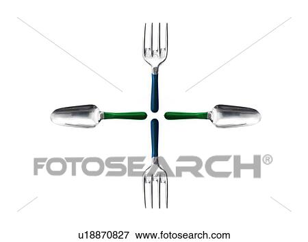 Stock Photo - Studio shot of spades and gardening forks. Fotosearch