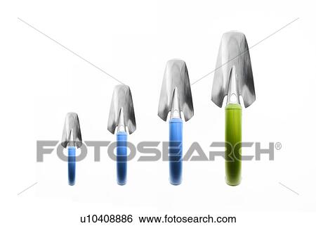 Studio shot of spades in row View Large Photo Image Stock Photograph - Studio shot of spades in row. Fotosearch
