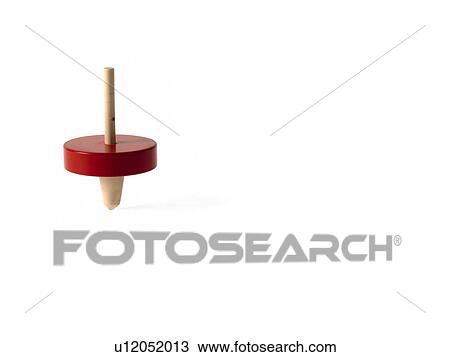 Stock Image - Studio shot of spinning top. Fotosearch