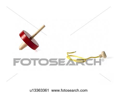 Stock Image - Studio shot of spinning top. Fotosearch