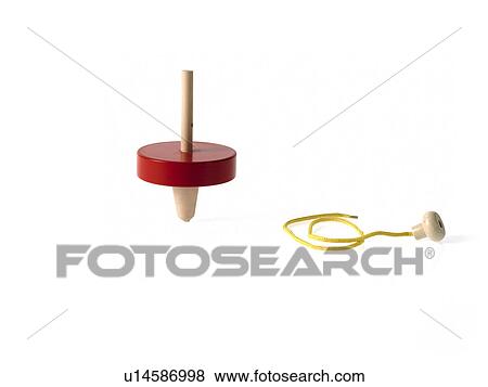 Stock Photo - Studio shot of spinning top. Fotosearch