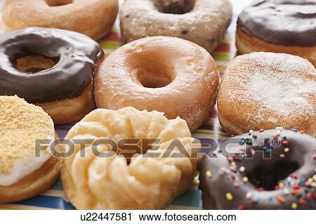 Stock Image - Studio shot of various donuts. Fotosearch