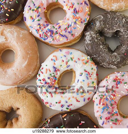 Studio shot of various donuts View Large Photo Image Stock Photo - Studio shot of various donuts. Fotosearch