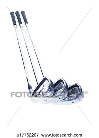 Three golf clubs on white background View Large Photo Image Stock Photo - Three golf clubs on white background. Fotosearch