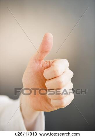 Stock Image - Thumb up. Fotosearch