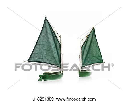 Stock Photo - Two toy boats on white background. Fotosearch
