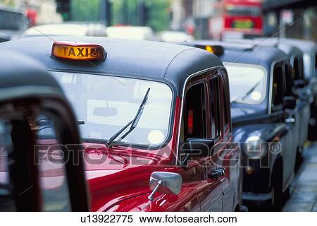 Stock Photography - UK, England, London, Row of cabs. Fotosearch