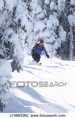 USA, California, Lake Tahoe, Mid adult woman skiing View Large Photo Image Stock Image - USA, California, Lake Tahoe, Mid adult woman skiing. Fotosearch