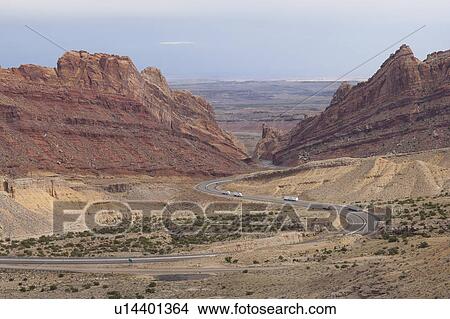Picture - USA, Colorado, Curved road on desert. Fotosearch