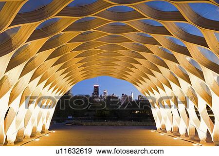 USA, Illinois, Chicago, Illuminated tunnel with city skyline in distance, dusk View Large Photo Image Stock Photo - USA, Illinois, Chicago, Illuminated tunnel with city skyline in distance, dusk. Fotosearch